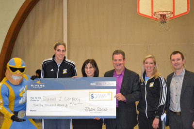 Left to Right: Chicago Sky Mascot, Sky Guy, Chicago Sky Forward, Elena Delle Donne, Daniel J. Corkery Elementary School Principal, Carol Devens-Falk, Rivers Casino General Manager, Bill Keena, Chicago Sky Assistant Coach, Christie Sides and Rivers Casino Promotions & Special Events Manager, Joey Hernandez.