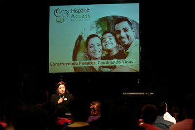 Maite Arce, president of Hispanic Access Foundation, addresses the crowd at a recent tax education workshop in Dallas, TX. As part of the campaign, nearly 200 free tax education workshops will be held in 18 markets nationwide. These workshops emphasize the importance of building an accurate tax history, provide insight on how to protect against fraud and misinformation in the tax preparation process, and outline how to meet some important requirements of the Affordable Care Act (ACA) and potential immigration rule changes.