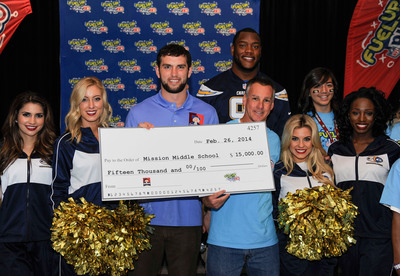 NFL player Andrew Luck presents Mission Middle School with $15,000 grant from Quaker to support wellness programs.