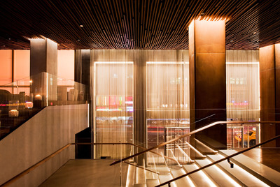 The Row NYC hotel's ultra contemporary lobby captures the buzz of Times Square.