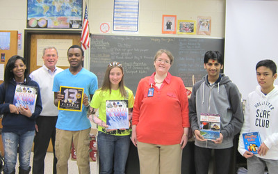 Lloyd C. Bird High School teacher Amanda Simon and her ninth-grade students receive their CITGO Fueling Education prize from CITGO Region Manager Arnold Walton in Chesterfield County, Va.