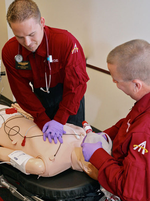Angel MedFlight's clinical team trains with true-to-life SimMan(R).