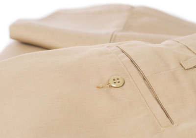 QUALITY CONSTRUCTION - One sign of a well-made pair of pants is the use of topstitches sewn parallel to a seam to help fabric facings stay in place; another indicator is button holes bound with thread for added durability.