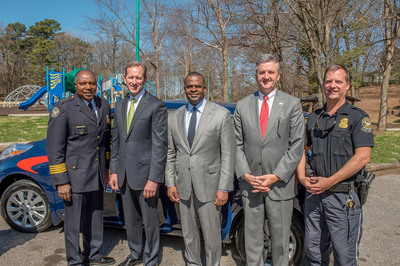 Georgia Power donated an all-electric Nissan Leaf to the Atlanta Police Foundation on March 20 to assist the Atlanta Police Department in providing public safety to the Atlanta BeltLine and surrounding communities. The donation occurred at Washington Park in southwest Atlanta. Pictured (left-right): Atlanta Police Chief George N. Turner; Georgia Power President & CEO Paul Bowers; Atlanta Mayor Kasim Reed; Police Foundation President & CEO Dave Wilkinson; and Atlanta Police Lt. Jeff Baxter.