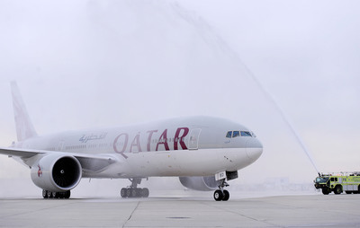 A traditional water salute welcomes Qatar Airways' inaugural flight at the Philadelphia International Airport on Wednesday, April 2, 2014, in Philadelphia. Qatar Airways is the first new international airline to introduce service to and from PHL in over a decade. (Michael Perez/AP Images for Qatar Airways)