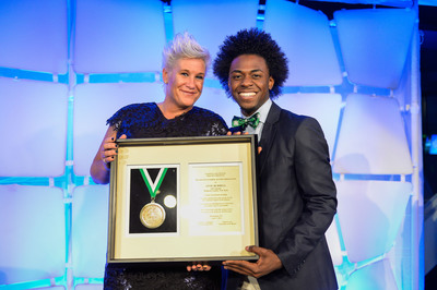 National 4-H Council Legacy Awards: Youth Trustee Lazarus Lynch Presents Food Network Host and New York 4-H Alumna Anne Burrell with the 4-H Legacy Awards Distinguished Alumni Medallion