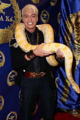 KUBA Ka with his pet snake Zeus