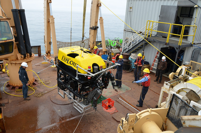 The Ocean Networks Canada (ONC) science crew surrounds instrument platform after recovery. IBM announced today that it is collaborating with ONC on a three-year, multi-million dollar project to equip British Columbia with a monitoring and prediction system to respond to off-shore accidents, tsunamis and other natural disasters. Photo courtesy Ocean Networks Canada.
