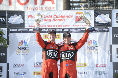 Kia Racing drivers Nic Jonsson and Mark Wilkins celebrate a double-podium finish on the Streets of Long Beach.