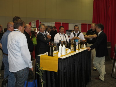 Tom Mueller, author of Extra Virginity: The Sublime and Scandalous World of Olive Oil, speaking to Retailers about olive oil at the 2013 KeHE Holiday Selling & Innovation Show.