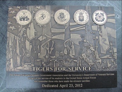 Etched and cast military plaques can be personalized with photos and imagery to honor the sacrifices of military veterans.