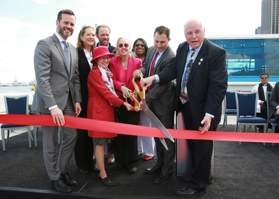 From left to right Fred Dixon, Catherine McVay Hughes, Margaret Chin, Murray Fisher, Gale Brewer, Debi Rose, Zac Smith and Terry MacRae cut the ribbon for the revitalization of Pier 15 at Hornblower Cruises & Events Pier 15 Launch Party at South Street Seaport, on Tuesday, May 6, 2014 in New York.