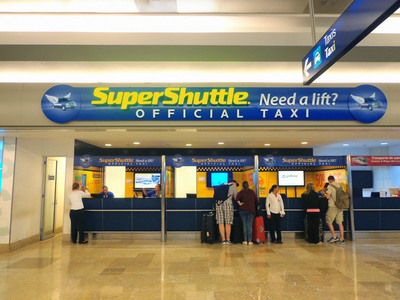 SuperShuttle desk at the Cancun International Airport. SuperShuttle provides shared-ride and ExecuCar (Black Car service) in Cancun and Cabo San Lucas, Mexico.