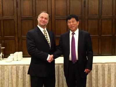 Robert Riola, CTO of IneedMD Inc (left) and Zhong Shu Ming, Vice Magistrate of Wuqing District, Tianjin China (right) at the Harvard Club in New York City last week.