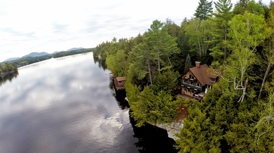 Up for Auction on July 19th: A rarely offered year-round Adirondack home with spectacular views.