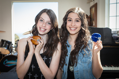 Dani and Lauren Cimorelli are all smiles with their Invisalign Teen clear aligners