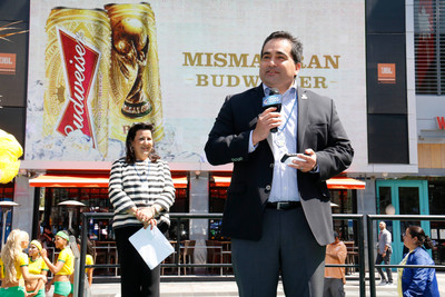 Los Angeles, June 17, 2014 - Fidel A. Vargas, president and CEO of the Hispanic Scholarship Fund (HSF) thanks Margarita Flores, vice president of community relations for Anheuser Busch for its contribution to the HSF.
