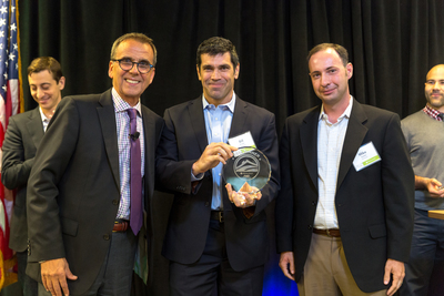 Matterport was named as the grand prize winner of the second annual Realogy 'FWD' Innovation Summit held in Madison, New Jersey. Pictured (l-r) are: Alex Perriello, chief executive officer, Realogy Franchise Group; and from Matterport, Bill Brown, chief executive officer and Mike Beebe, co-founder and chief operating officer. Matterport’s computational photography technology enables rapid high-quality 3D visualization of physical spaces, which encompasses individual room-level views...