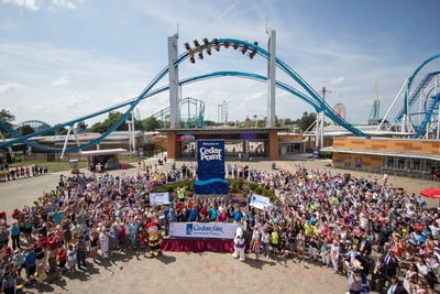 Cedar Fair's president and chief executive officer, Matt Ouimet, rings the NYSE Closing Bell amidst a celebration of summer at "The Best Amusement Park in the World," Cedar Point, in Sandusky, Ohio.