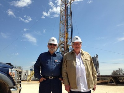 Dr. Kent Moors (left) & Jack W. Nichols (right) inspect the $45MM project-s first well