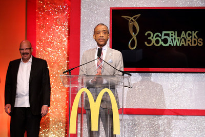 NEW ORLEANS - (July 5, 2014) - Civil rights activist Rev. Al Sharpton accepts an award presented by veteran radio personality Tom Joyner during the 11th annual McDonald's 365Black Awards, held at the New Orleans Theater July 5. McDonald's 365Black Awards are given annually to salute outstanding individuals who are committed to making positive contributions that strengthen the African-American community.