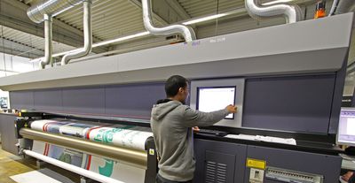 Same Day Printing for Mesh and PVC Tarpaulins Now at onlineprinters.co.uk