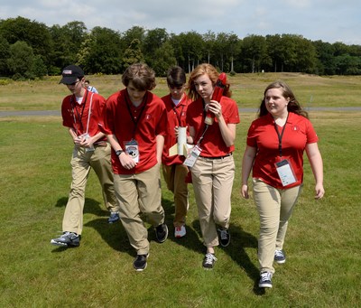 The U.S. student rocketry team, sponsored by Raytheon Company, captured second place in the 2014 International Rocketry Challenge in Farnborough, England on July 18, 2014. The team from France placed first and the team from the U.K. placed third. The five-member team is from Creekview High School of Canton, Ga.. From left to right: Austin Bralick, 16; Andrew White, 16; Nick Dimos, 16; Amanda Semler, 18; and Bailey Robertson, 15.