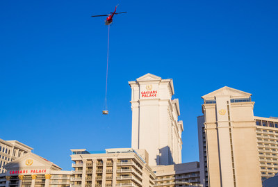 A helicopter delivers a Japanese-inspired onsen tub to the rooftop sky deck of the Nobu Villa at Nobu Hotel Caesars Palace Las Vegas. The 10,300 square feet Nobu Villa is set to debut later this summer and marks the completion of the world's first Nobu Hotel. Photo Credit: Erik Kabik/ Retna
