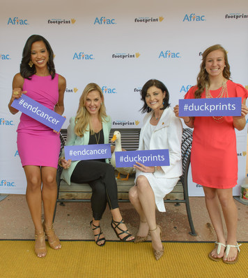 Mia Gradney with KHOU, left Kendra Scott jewelry designer, Catherine Blades SVP Corporate Communications for Aflac, Caitlyn Mortus, 18 year-old patient designer pose with Aflac Duck during the Aflac Duckprints event at MD Anderson, 07/23/14.