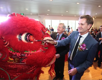 FMC Corporation President, CEO and Chairman Pierre Brondeau (foreground) along with U.S. Ambassador to China Max Baucus, paint the eye of the lion to symbolize prosperity during the opening of the company's Asia Innovation Center in Shanghai.  The new center features world-class laboratories for crop protection research and unique facilities designed to develop new ingredients used in the health and nutrition markets.