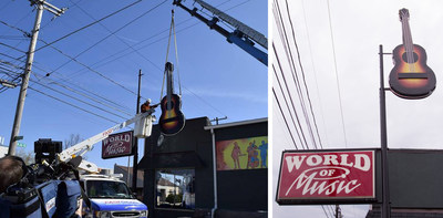 After refurbishing the decades old guitar sign, FASTSIGNS installed it back above the World of Music store in Erie, PA.