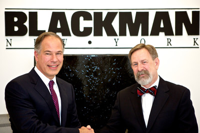 (R-L) David Krakoff, President of the Americas Sales Division for TOTO USA, and Robert Mannheimer, President and CEO of Blackman Plumbing Supply, ink landmark distribution agreement for the Northeast region of the U.S.