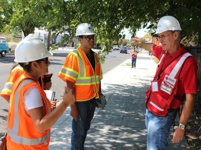 PG&E employees and an American Red Cross representative work together during the Napa earthquake response effort.