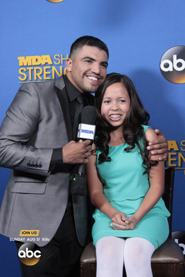 Champion boxer/ actor Victor Ortiz chats with 15-year-old MDA Ambassador Abbey Umali on the blue carpet at the 2014 MDA Show of Strength Telethon. The 49th annual broadcast airs Sunday, Aug. 31 9|8c on ABC stations nationwide to raise funds and awareness in support of MDA’s mission to save and improve the lives of children and adults fighting muscle disease.