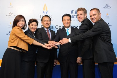 Mr Nopparat Maythaveekulchai (third left), President of the Thailand Convention and Exhibition Bureau or TCEB, Mr Christopher Kim (third right), President of Asia Pacific, Unicity International Inc., and Ms Vichaya Soonthornsaratoon (second left), Director of Meetings Industry Department, TCEB. join forces to bring "2014 Unicity Global Convention" to Thailand. The event will be held in Bangkok from 15 to 18 October 2014 with 50,000 Unicity distributors worldwide.