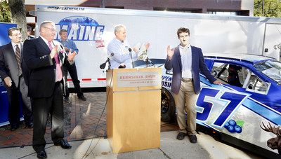 NASCAR driver Austin Theriault (far right) unveiled the new Maine race car in Portland and Bangor, ME alongside Maine's Governor Paul Lepage (left). Photo Credit: Tim Greenway.
