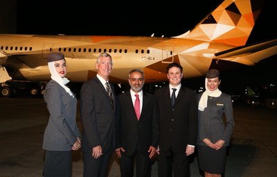 Larry Loftis, Boeing Vice President and General Manager - 787 Program, H.E Abdulla Alsaboosi, Honourable Consul General to the UAE in Los Angeles, and Peter Baumgartner, Etihad Airways Chief Commercial Officer, celebrate the roll out of Etihad Airways’ first Boeing 787-9 Dreamliner.