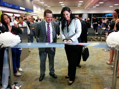 Minister of Transport and Public Works Paola Carvajal performed the ribbon cutting of TAME's inaugural flight from Fort Lauderdale to Quito.