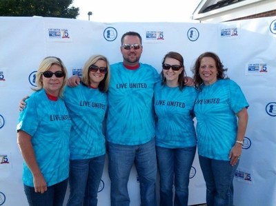 Community Bank of the Chesapeake employees at the Day of Caring in Fredericksburg. Pictured from left to right: Loan Support Specialist Mimi Fowler; Customer Service Representative Paula Jenkins; Senior Lender Tony Farland; Commercial Loan Officer Laura McKinnon; and Branch Manager Linda Caporali.