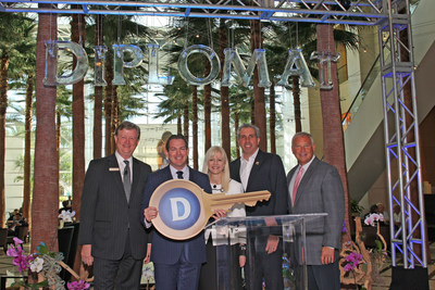 General Manager Ed Walls presents the key to the Diplomat to Hollywood Mayor Peter Bober, joined by Dianna Vaughan, global head of Curio - A Collection by Hilton, Thayer Lodging Group Managing Director Shai Zelering and Joe Berger, President, Americas, Hilton Worldwide.