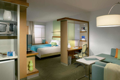 Fairfield Inn & Suites Canton South sleeping room.
