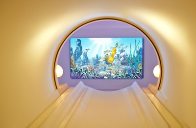 Engaging visuals are displayed on the back wall and can be seen via a mirror on the head coil, while patients can listen to music/sound through the headphone
