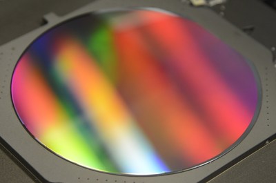 EV Group's NILPhotonics(TM) Competence Center assists customers in leveraging EVG's nanoimprint lithography (NIL) solutions to enable new photonic products and applications. Shown here is a six-inch full-area nanoimprinted wafer processed by EVG NIL solutions. This technology enables almost infinite design freedom to create various kinds of photonic structures.