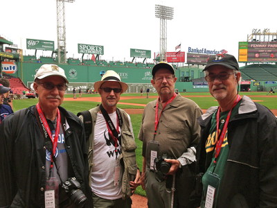 John Rosskopf (second from the left) and lifelong buddies enjoy being on field at Fenway Park while on their East Coast bucket list baseball tour.