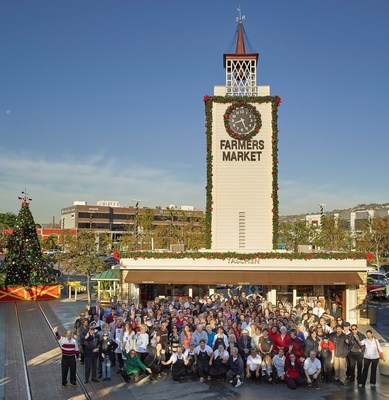 Celebrating its 80th anniversary, The Original Farmers Market in Los Angeles gathered together nearly all of the 100  shopkeepers, employees, management and facilities staff in front of The Market's iconic Clock Tower today for this historic photo.   This first ever "All Farmers Market" picture includes many multi-generation family owned and operated businesses and multiple generations of the Gilmore family, who have owned and operated The Market since it opened.  The Original Farmers Market at 3rd & Fairfax has been Los Angeles' favorite gathering spot for locals and tourists since 1934. Photo: Courtesy of the A.F. Gilmore Company, www.farmersmarketla.com.