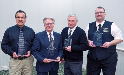 Million-mile safe drivers Luis Garcia, Carl Briggs, Al Kline, and Jerry VanDeusen Jr. were honored by Indian Trails bus company and the State of Michigan for collectively transporting 1.5 million passengers more than 5 million miles without an accident.