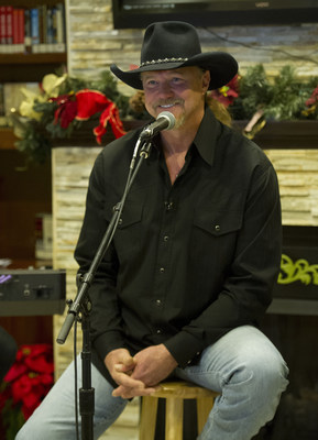 Trace Adkins surprised guests and staff by performing songs from his current Christmas Show Tour at a Country Inns & Suites By Carlson hotel in Nashville on Thursday, Dec. 11, 2014 in Nashville, TN.