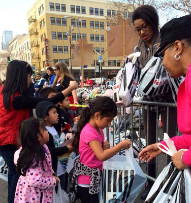 Santa & His Elves Bring 50,000 Toys To 10,000 Poor Children & Their Families On Skid Row At Fred Jordan Mission