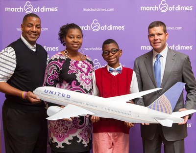  2015 March of Dimes Ambassador family Todd Jackson, United employee Elise Jackson and son Elijah with United Executive Vice President, Chief Fint, holding a model United airplane.