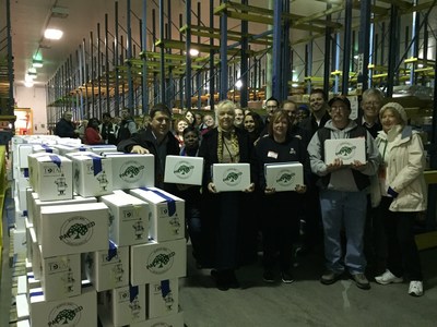 Piedmont Petroleum Employees Pack Boxes of Food at Harvest Hope Food Bank